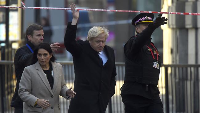 Boris Johnson and Home Secretary Priti Patel visit the scene of the London Bridge stabbing attack. Picture: Getty Images