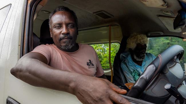 Katherine Country Bus driver Abdelrahim Khalifa and customer Sam Harvey were disappointed to have Centrepay services taken away. Picture: Pema Tamang Pakhrin