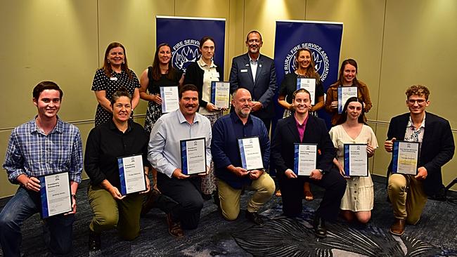 Tuncester firey Trudy Osborne, front row, second from left, is one of 11 to receive a scholarship through the Rural Fire Service Association that will give her additional training to become a more adept emergency response professional.