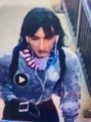 Suspected Highland Park gunman Robert Crimo allegedly fleeing the scene while wearing women’s clothing to disguise himself. Picture: WGN-TV.