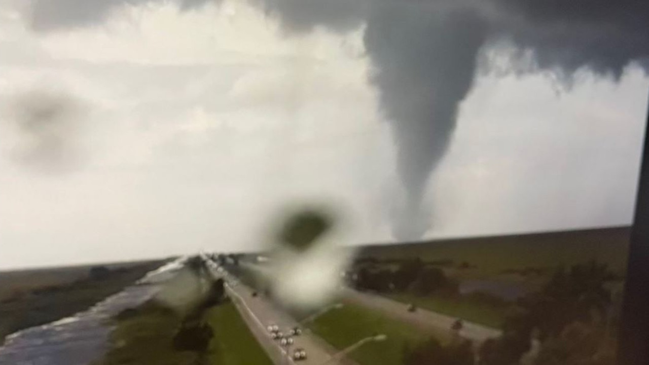 A tornado spawned from hurricane Milton hits near a key motorway in southern Florida.