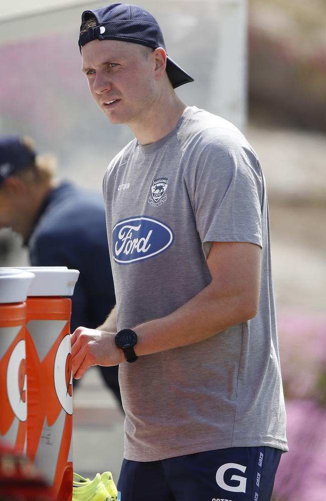 Mitch Duncan gets a drink at Cats training at Deakin University. Photo: Dylan Burns/AFL Photos via Getty Images