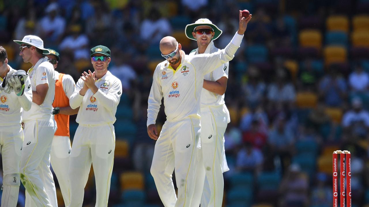 Nathan Lyon celebrates his special moment. Photo by Dan PELED / AFP.