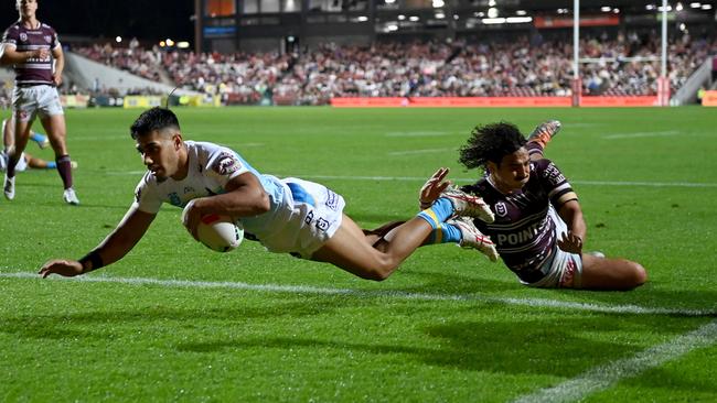 Alofiana Khan-Pereira scores a try for the Titans. Picture: NRL Photos