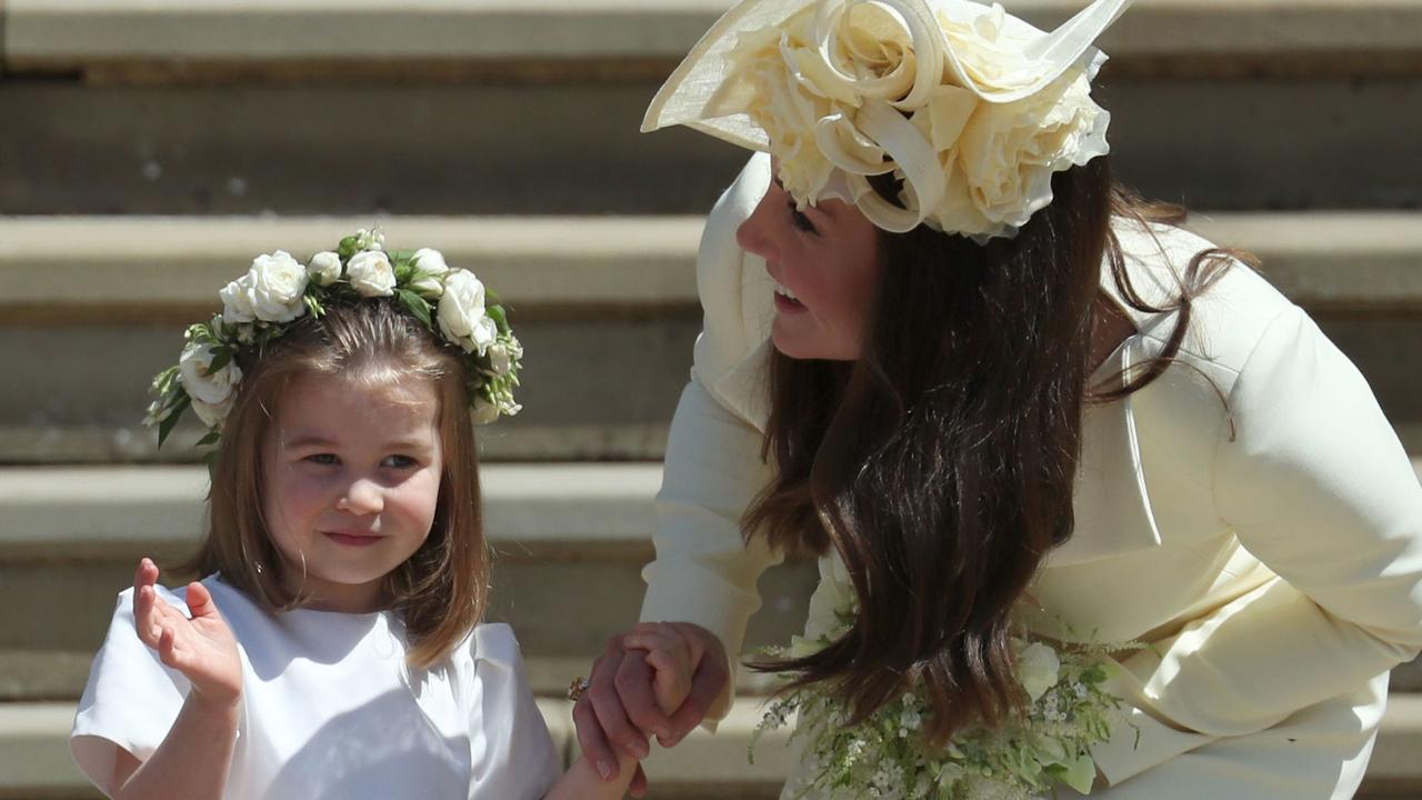 Princess Charlotte waves by her mum at Harry and Meghan’s wedding. Picture: Jane Barlow/AFP