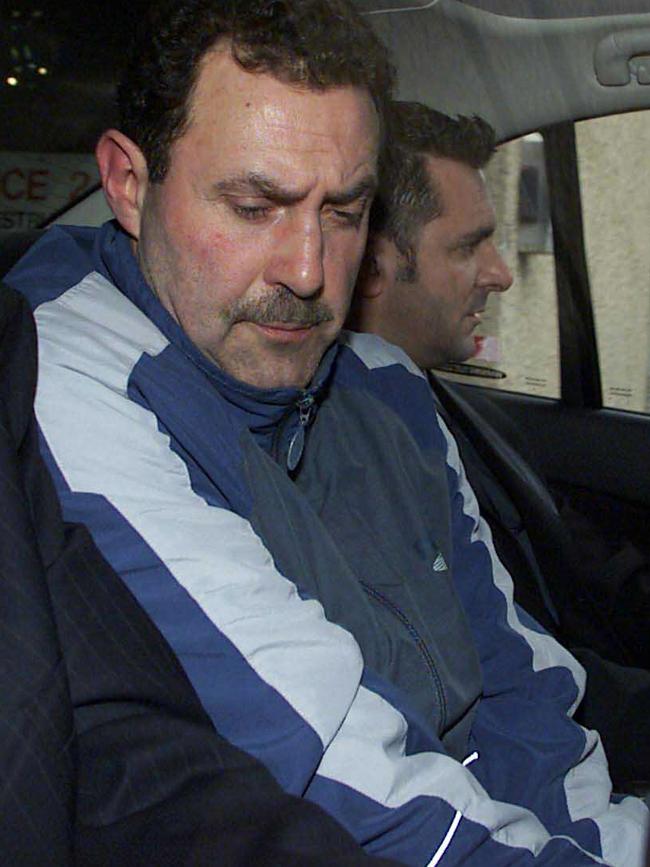 Condello in police custody in 2004. Picture: Colin Murty