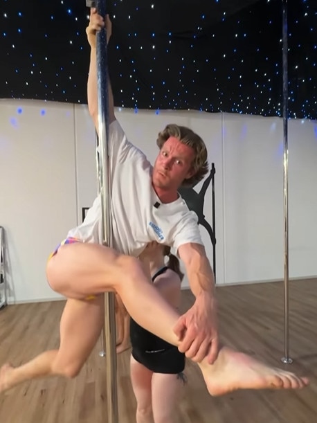 Aussie Edwards being put through his paces in a pole class. Picture: Instagram @betheonebt1