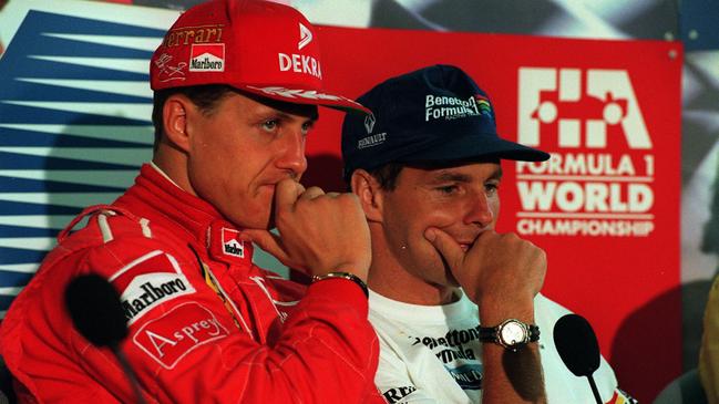 Michael Schumacher with Gerhard Berger at Albert Park in 1996.