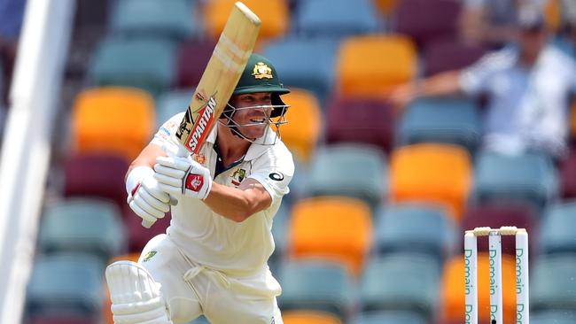 David Warner drives through the covers on his way to a century.