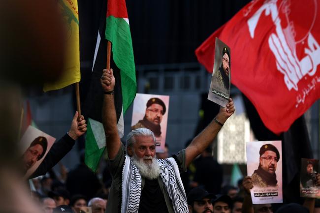 Hezbollah supporters during Fuad Shukr's funeral in the southern suburbs of the Lebanese capital Beirut