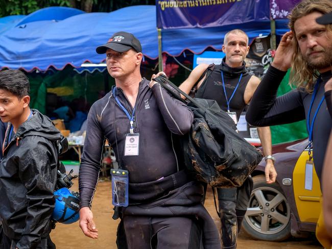 Foreign divers head to Tham Luang Nang Non cave during the rescue operation. Picture: Getty