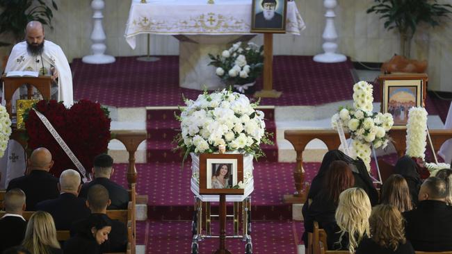 Ms Fadlallah’s coffin was covered in flowers. Picture John Grainger