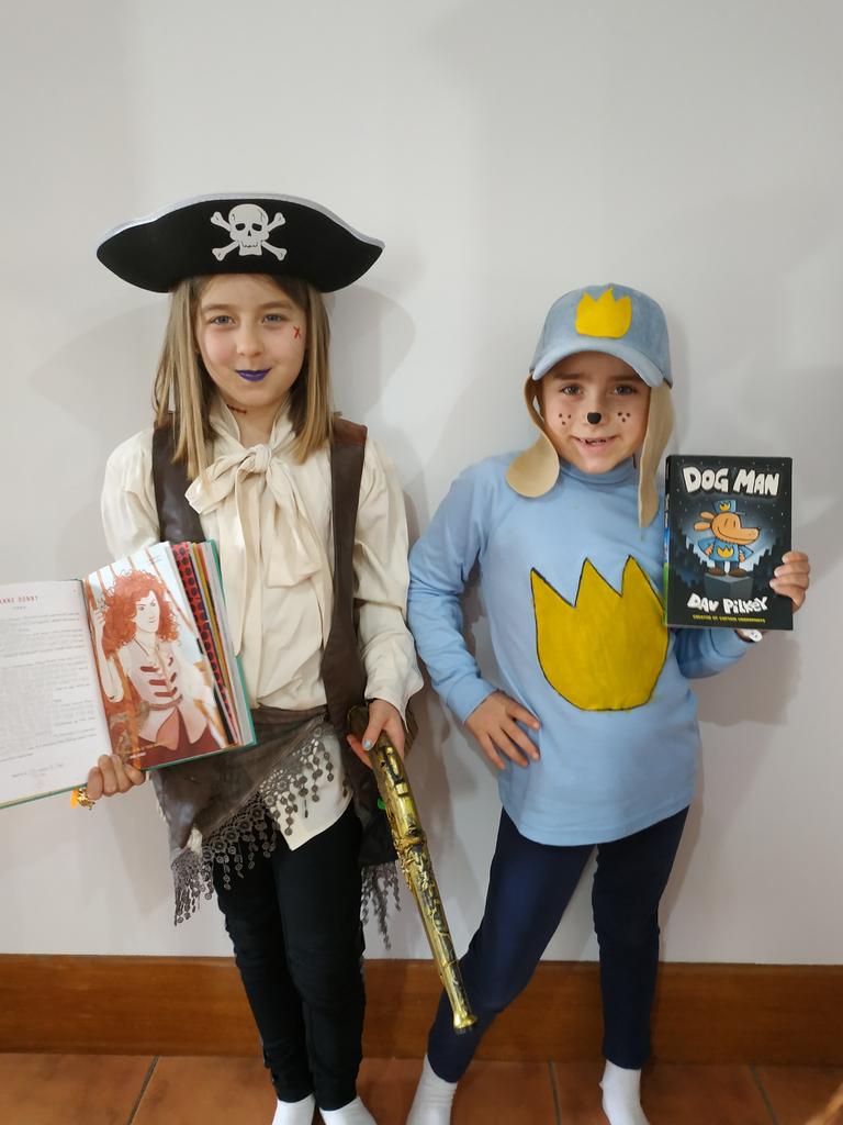 Bella dressed up as Anne Bonny (female Irish pirate) and Lili dressed up as Dogman.