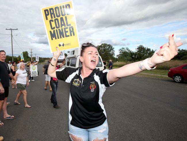 A pro-coal activist taunts the Bob Brown led anti-Adani convoy on Herschel St, Clermont, on Saturday, April 27, 2019. Picture: Steve Pohlner