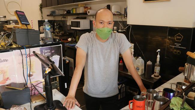 Simon Dang who runs Egg Shell Cafe in Macquarie street. His cafe has been impacted by the train strike. Picture: John Feder/The Daily Telegraph.