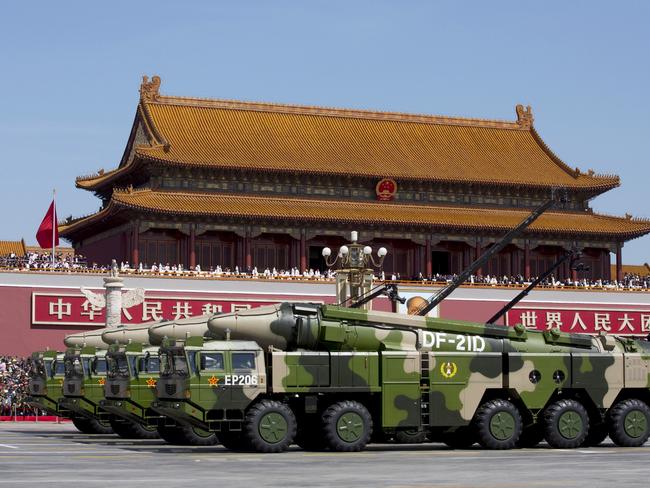 Chinese military vehicles carrying DF-21D anti-ship ballistic missiles travel past Tiananmen Gate during a military parade to commemorate the 70th anniversary of the end of World War II in Beijing Thursday Sept. 3, 2015. REUTERS/Andy Wong/Pool      TPX IMAGES OF THE DAY