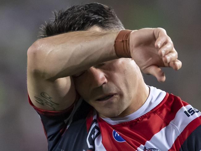 Cooper Cronk of the Roosters tackles Josh Papalii of the Raiders without the ball and is sin binned during the 2019 NRL Grand Final between the Canberra Raiders and the Sydney Roosters at ANZ Stadium in Sydney, Sunday, October 6, 2019. (AAP Image/Craig Golding) NO ARCHIVING, EDITORIAL USE ONLY