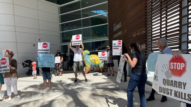 Protesters outside council over Oxenford quarry.