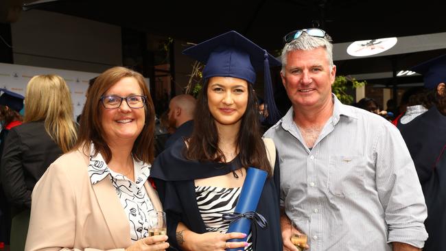 Graduate Hannah McDonald with mum Fiona and dad Haydn at the Deakin University Graduation post ceremony celebration. Picture: Alison Wynd