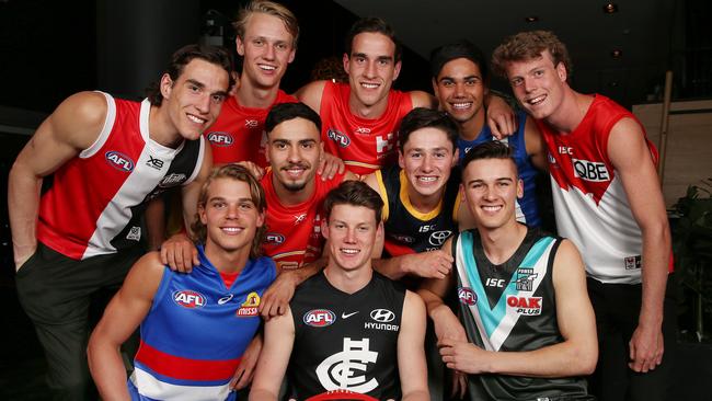 Bailey Smith, Sam Walsh and Connor Rozee (front) were the stand out players in the AFLCA awards.