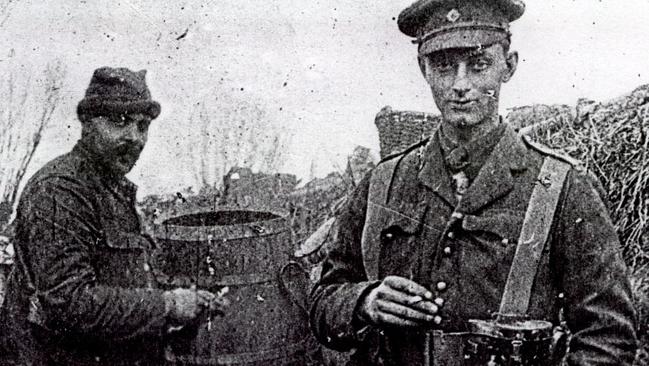 1914 : Soldiers take a break during the unofficial Christmas truce in 1914, during World War i [One] when British and German soldiers stopped fighting over Christmas. The event is featured in TV documentary film "The Christmas Truce".