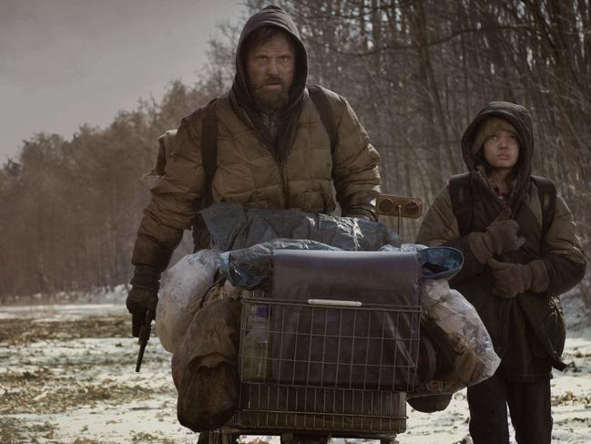 Keepers of the flame: Viggo Mortensen (L) and Kodi Smit-McPhee in the 2009 film 'The Road', based on Cormac McCarthy's Pulizter Prize winning novel.