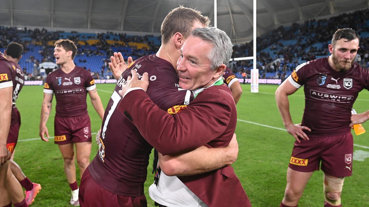 Green is embraced by Queensland captain Daly Cherry-Evans after the Maroons’ Game 3 victory this year. Picture: Getty