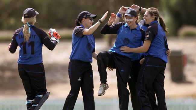 Sturt players celebrate a wicket during the grand final triumph over Southern District. Picture: AAP/Dean Martin