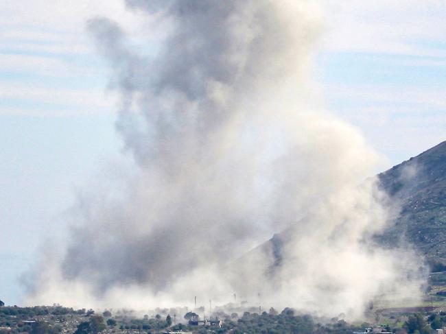 A picture taken from the outskirts of south Lebanon's village of Aitaroun shows smoke billowing after a raid carried out by Israeli warplanes. Picture: AFP