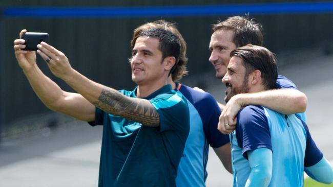 Tim Cahill takes a selfie with NYCFC players,Andrea Pirlo, Frank Lampard (centre) and former Melbourne City player David Villa (L).