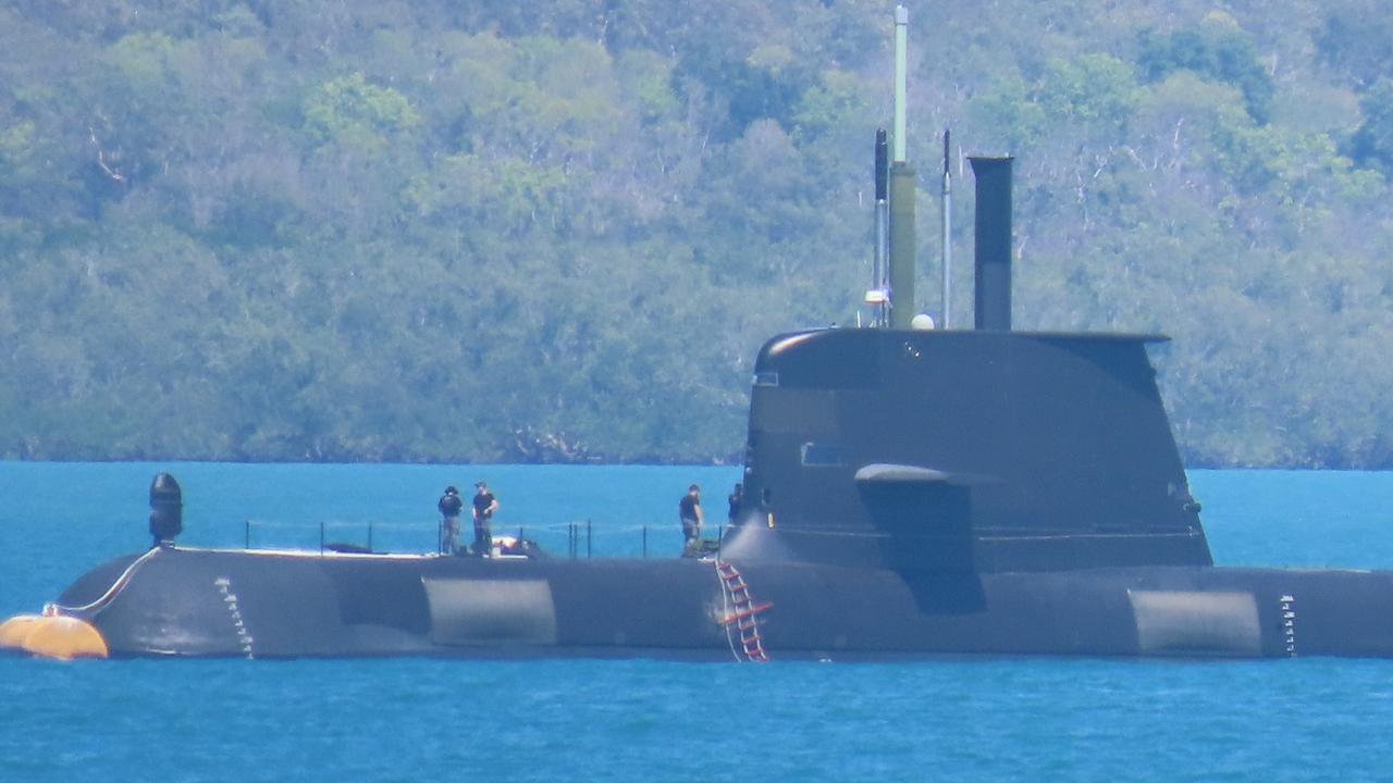 The crew of HMAS Dechaineux could be seen from afar. Picture: Harry Brill.