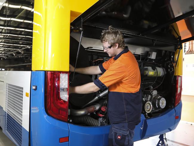 Business - Keegan Berg on the bus production line for Volgren buses at Eagle Farm. Pic Mark Cranitch.