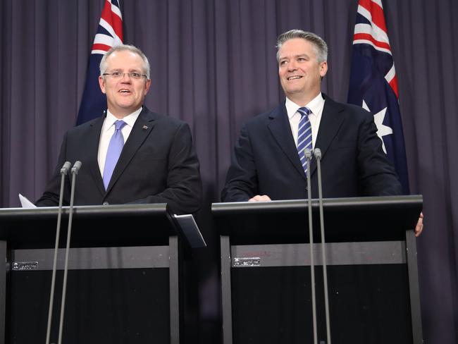 Treasurer Scott Morrison with Mathias Cormann delivering the MYEFO today at Parliament House in Canberra. Picture: Gary Ramage