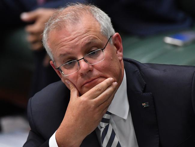 CANBERRA, AUSTRALIA - MARCH 25: Prime Minister Scott Morrison during Question Time in the House of Representatives at Parliament House on March 25, 2021 in Canberra, Australia. The federal government was on Monday set back by new allegationsÃÂ broadcastÃÂ by the Ten Network after pixelated images of unnamed Coalition advisers allegedly engaging in performing lewd sex acts on the desks of female MPs resulting in a Morrison staff member being sacked last night. Additionally, the ABC Network aired a first hand account by an Australian Parliament security guard of what she witnessed on the night Brittany Higgins was allegedly raped in the office of then-defence industry minister Linda Reynolds in early 2019. (Photo by Sam Mooy/Getty Images)