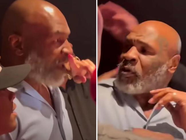 A female fan got right up in Mike Tyson’s face during a photo. Picture: FightHype.com