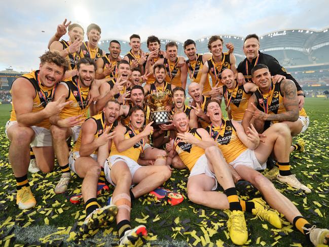 Tigers players celebrate after winning the SANFL Grand Final match between Norwood and Glenelg at the Adelaide Oval in Adelaide, Sunday, September 22, 2024. (SANFL Image/David Mariuz)