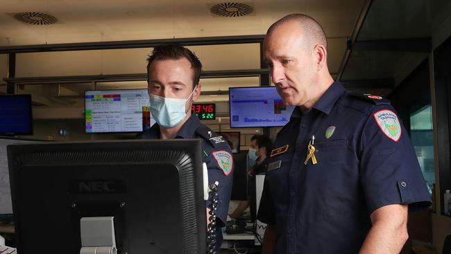 Sam Keating dispatcher with Joe Acker in the operations call room. Ambulance Tasmania chief Joe Acker at the Hobart station. Picture: Nikki Davis-Jones