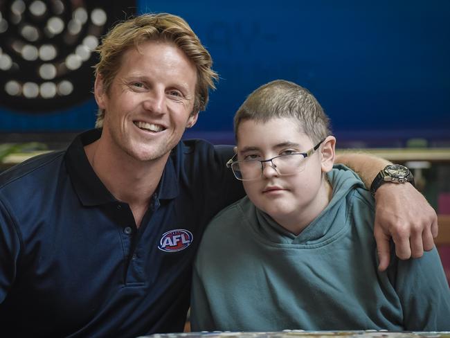 Rory Sloane at Ronald McDonald House with 14-year-old Cooper. Picture: Roy VanDerVegt