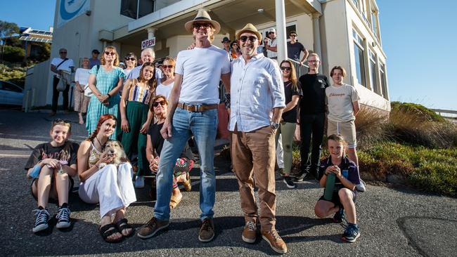 David Bagshaw and Kayne Ensten with members of a community group at the Marino Rocks Cafe in Marino. Picture Matt Turner.