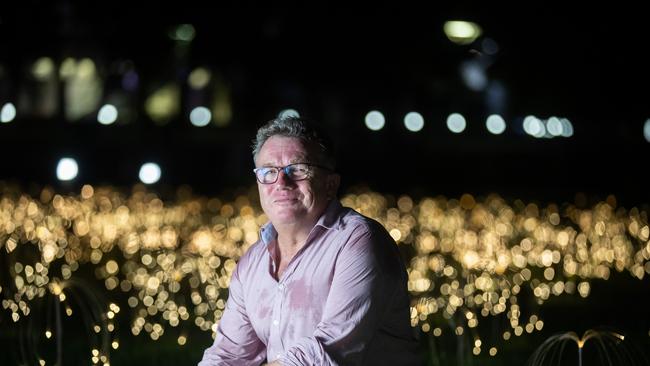 Bruce Munro in front of his Tropical Light illuminated sculpture Sun Lily. Tropical Light was an outdoor exhibition featuring eight illuminated sculptures across Darwin’s CBD by world renowned artist Bruce Munro.