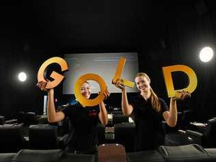 COMING SOON: The new cinemas at Kawana Shoppingworld will be open soon. Justiss Adams, 19, Beerwah and Tayla Dangerfield, 20, Buderim. Picture: John McCutcheon