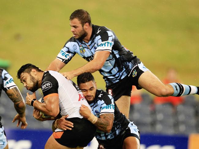 Tigers David Nofoaluma in actionduring the Wests Tigers v Cronulla Sharks pre season trial game at Campbelltown Stadium , Campbelltown. Pic Jenny Evans