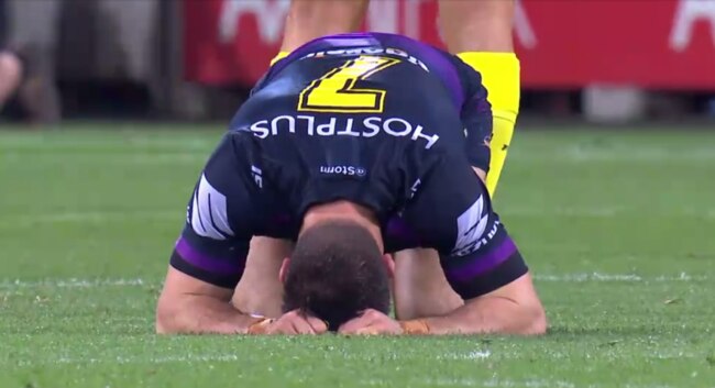 Cooper Cronk stays down after a hit from Adam Blair.