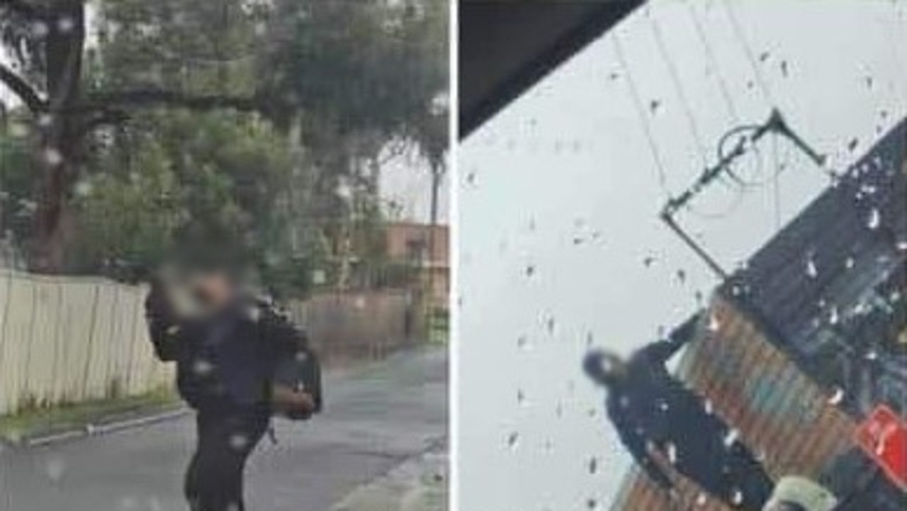 The man dressed in all black, carryign a large backpack was seen on the roof of the shops in footage shared to Facebook.