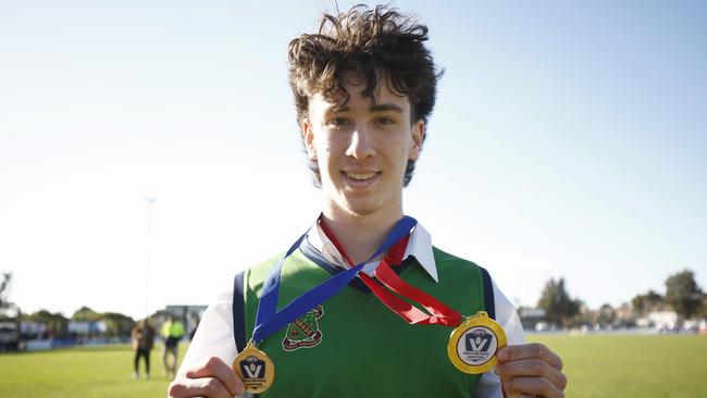 Sebastian Murphy of Parade College with his two medallions. (Photo by Daniel Pockett/AFL Photos/via Getty Images)