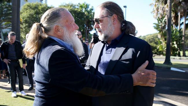 Jack Thompson congratulates Russell Crowe at the announcement of the movie studio on the Pacific Bay Resort site in Coffs Harbour. Pic Nathan Edwards