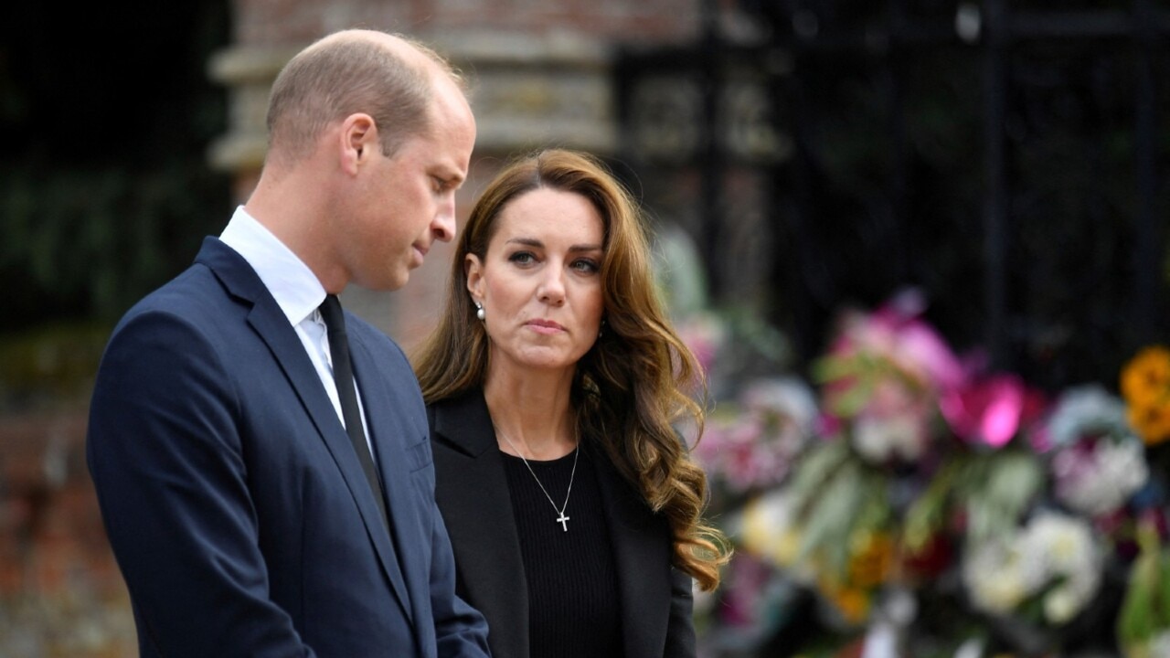 Kate Middleton in black for Aberfan; Adorable baby swipes her bag!