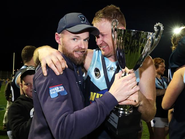 Lindisfarne coach Daniel Willing and captain Michael Cassidy celebrate after the team’s win but Willing later announced he was stepping down. Picture: NIKKI DAVIS-JONES