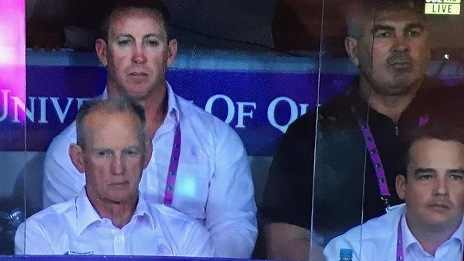 Former Brisbane official and player Andrew Gee (back, right) in the Broncos' coaches box during the elimination final loss the St George Illawarra.