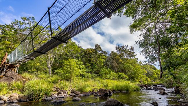 Set on over 3,000sq m of freehold land in a nature reserve in the Sunshine Coast hinterland, a 1.2 km stretch of the Obi Obi Creek flows through the centre of the property, which also features a cool suspension bridge and a large private swimming hole with rapids. The naturally landscaped gardens are beautiful, with a Japanese-inspired rock garden a standout feature. Carefully planned pathways throughout the property lead to nature walks and a meditation labyrinth.